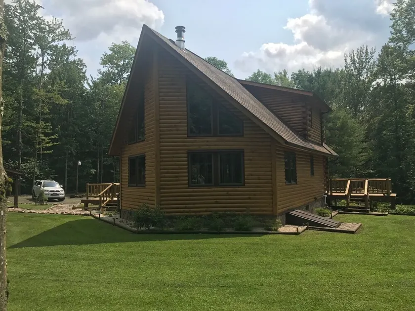 secluded log home, minutes from all star village in Oneonta - Image 1