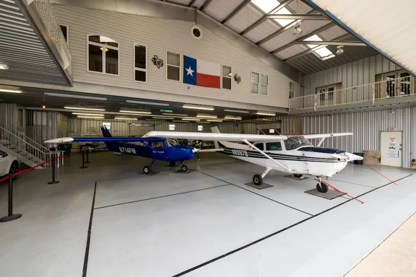 The Hands Down COOLEST Stay in Fort Worth - Active Airplane Hangar  - Image 1