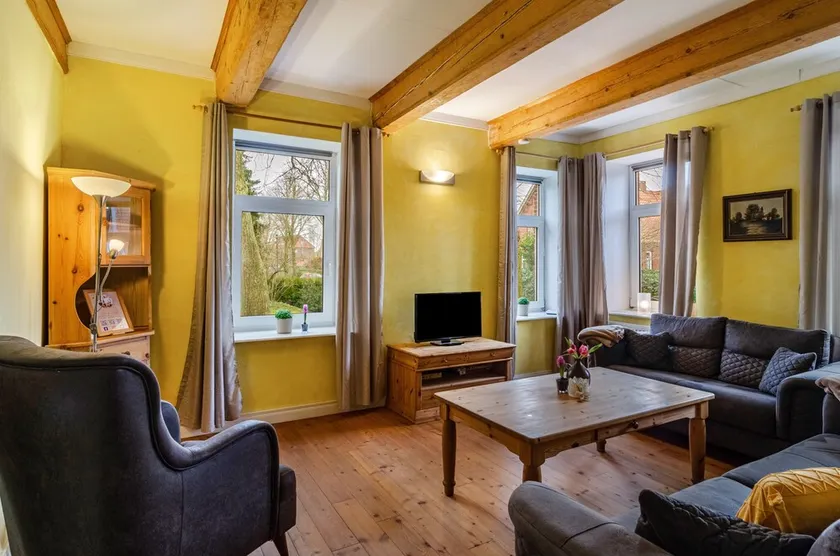 Appartamento 'Gulfhof Oldersum Dachgeschoss' con terrazza, giardino e Wi-Fi in comune - Image 1