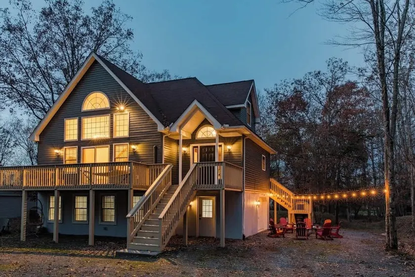 Step into Luxury by the Lake: Stunning Chalet with Hot Tub, Sauna, & Game Room  - Image 1