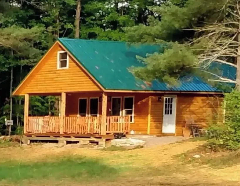 Located in the Finger Lakes a cabin in the country w/ trails & fishing   - Image 1