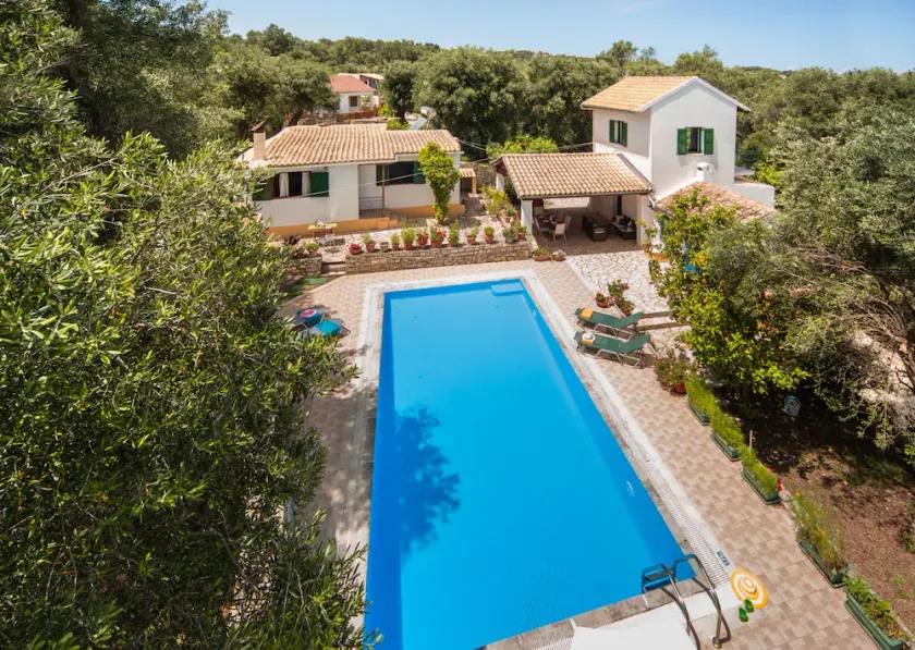 Indulge in Peace: A Paxos Sanctuary by the Olive Groves. - Image 1