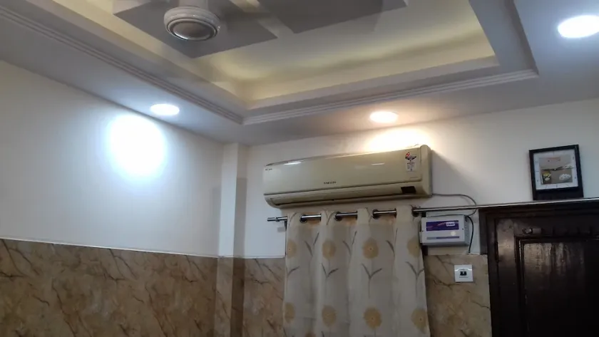 One bedroom apartment with attached kitchen and washroom along with fridge - Image 1