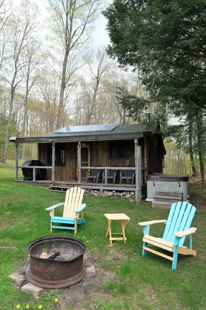 Spacious Rustic Cabin with Pond Views, Lake Access, Hot Tub and Dog-Friendly! - Image 1