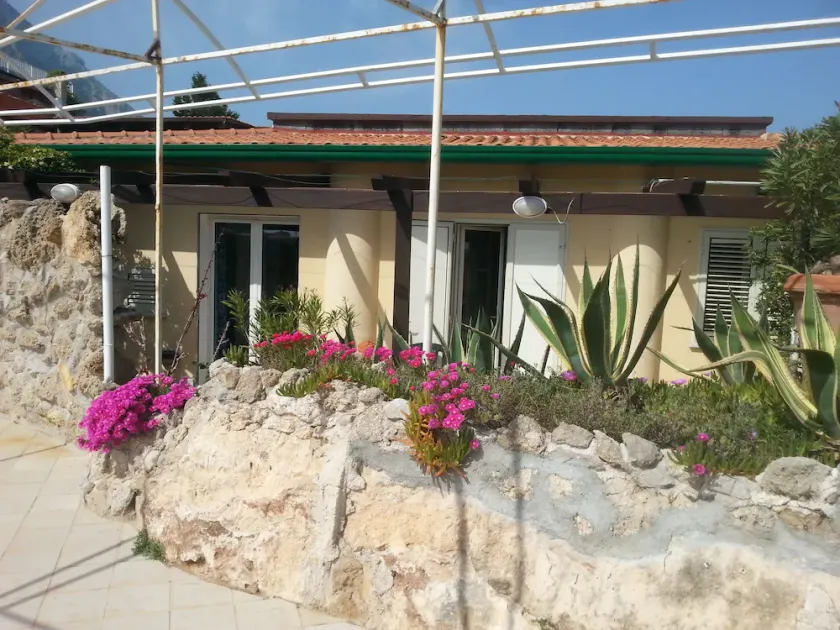 The property is located by the sea and has its own private beach. - Image 1