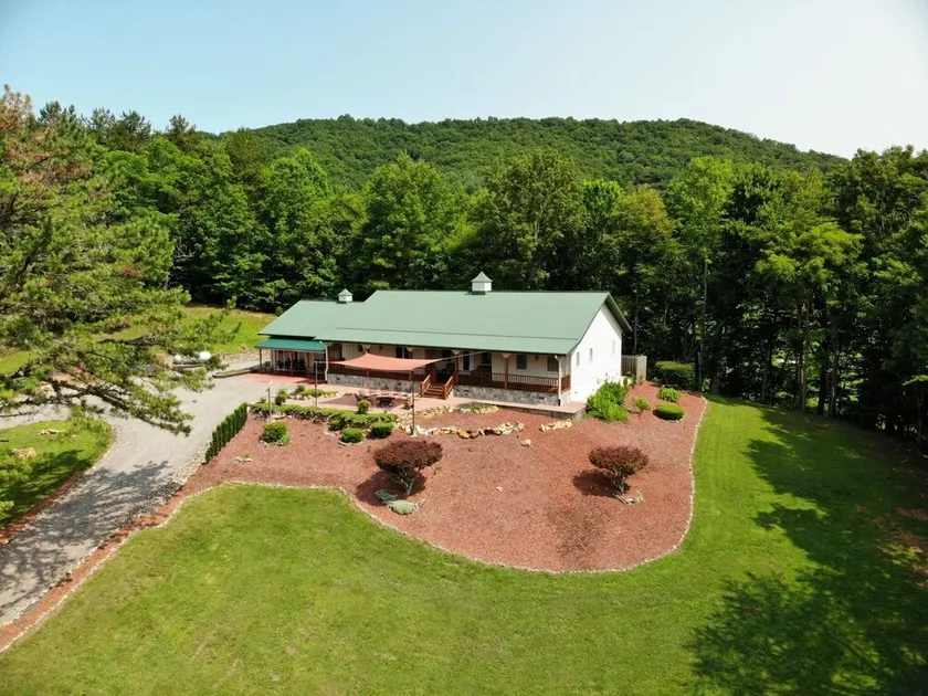 Secluded home on 24 acres - Image 1