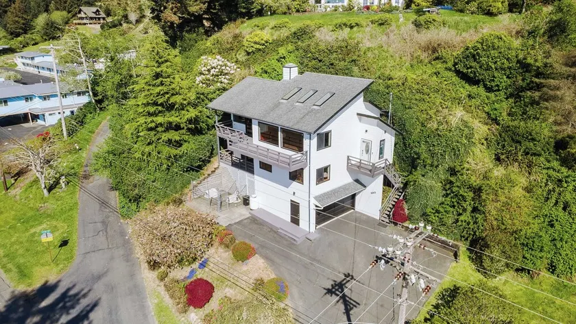 Overlook the Winchester Bay Harbor from the spacious 3rd Level! - Image 1