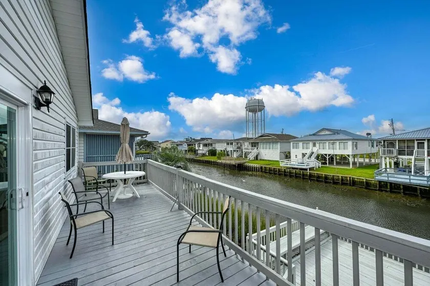 Channel-Front 4BR • Fish Kayak Dock Water Views • Snowbirds Welcome • Marsh View Getaway - Image 1