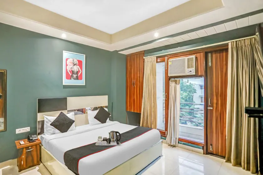 Qotel Hotel Church House Rohini Sector15 - Image 1