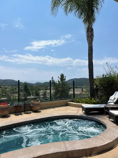 180-degree mountain views from heated spa to overlook the exquisite golf course. - Image 1