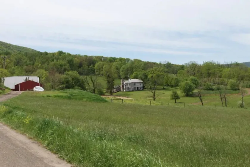 Unique Colonial Log House Secluded Near White Tail - Image 1