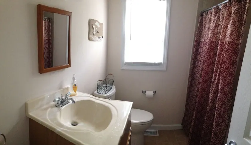1st Fl of duplex. Sunsets over the bay, walk to beach. Great family getaway. - Image 1