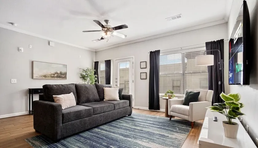 King Beds and Memory Foam Sleeper in Vibrant ATX Apt - Image 1