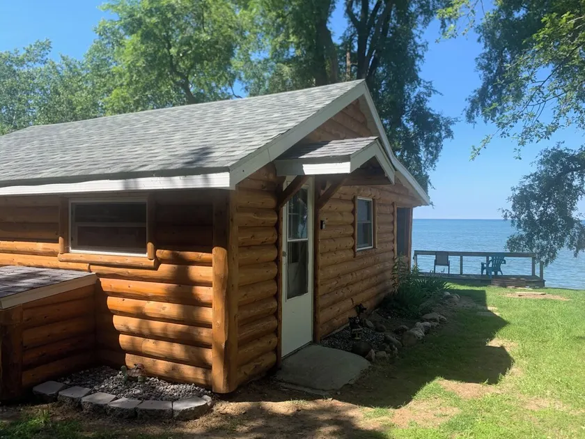 View glorious sunrises and sunsets from this cozy cabin right on Lake Huron! 🌅 - Image 1