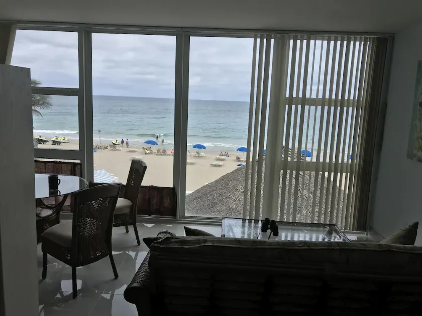 Oceanfront condo, beach, pool. 4 eateries on premises. Rent kayaks and jet skis. - Image 1