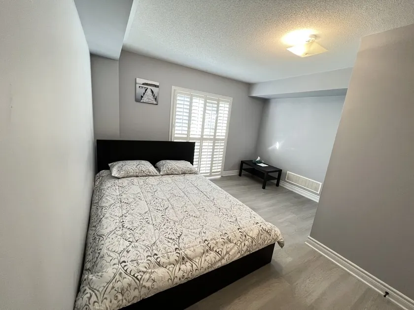 One bedroom ensuite toilet on main level & kitchen, living, bathroom lower level - Image 1