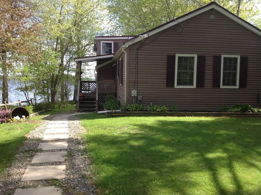 3 Bedroom year round lakefront home on Three Mile Pond with private dock - Image 1