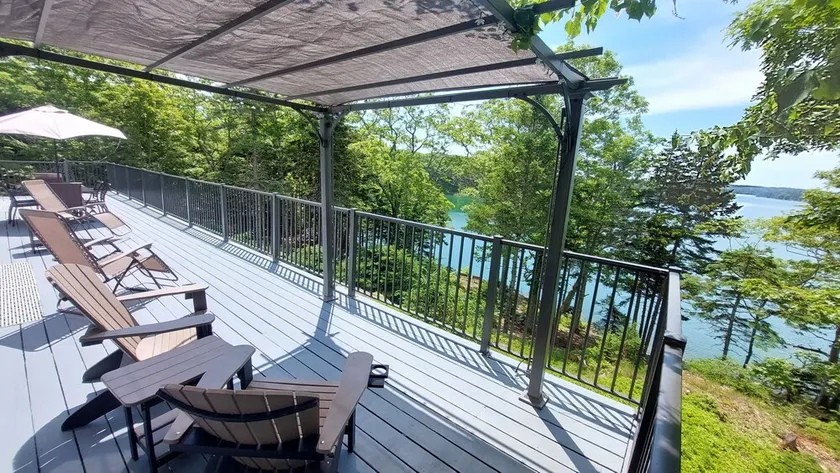 Waterfront Home with Expansive 50-Foot Deck and Stunning Water Views - Image 1