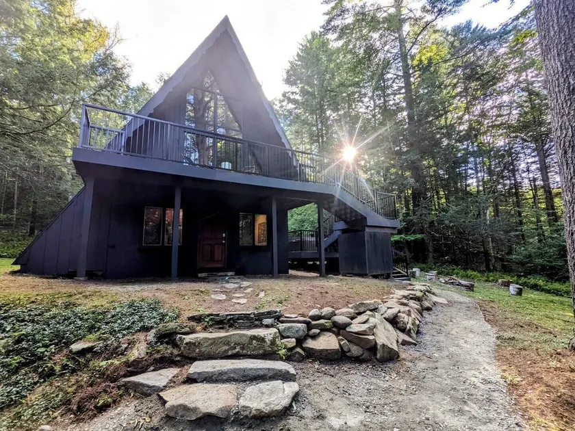 Cozy Vermont A-frame on a quiet private road, minutes from Stratton. Enjoy year-round adventure, then unwind in the hot tub under the stars. Spacious, stylish, and perfect for groups seeking both relaxation and outdoor fun. - Image 1