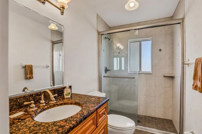 Dog-friendly beachfront home with beach access, deck, fireplace, W/D, AC - Image 1