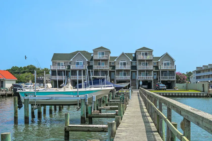 Charlie's Bayside Retreat | South Main Waterfront w/ Private Boat Slip, Screened Porch & Pets - Image 1