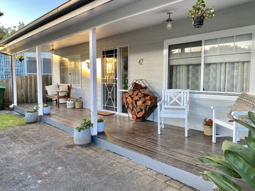Relax in a recently renovated Hamptons-style home away from home.  Pet friendly. - Image 1