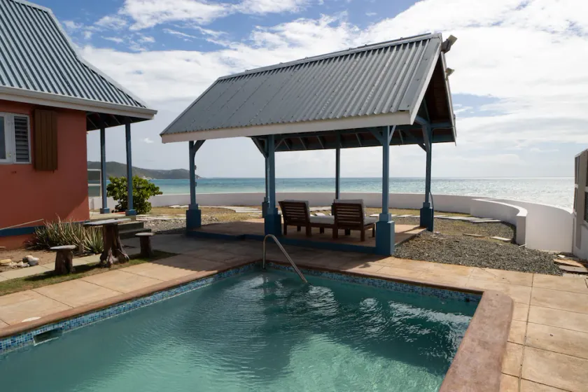 Timeless - Lovely beach cottage. Private pool, ocean view, beach access. R &R ! - Image 1
