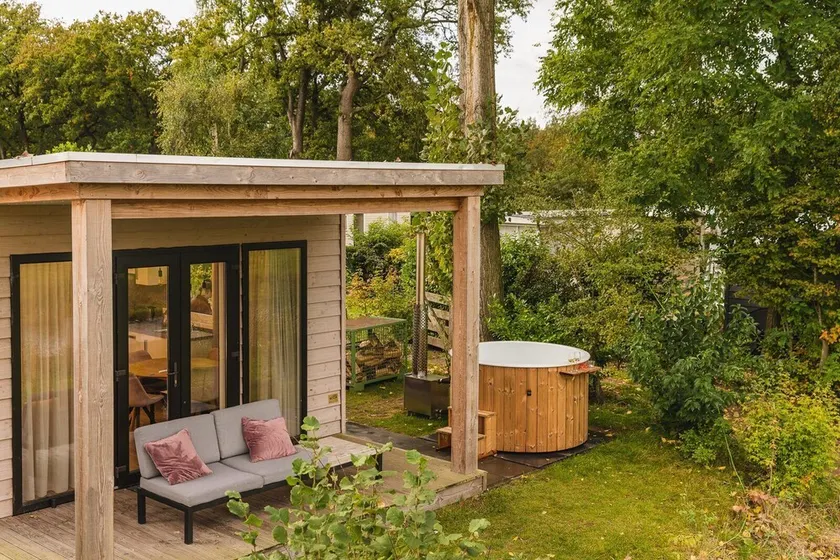 A lodge with hot tub and views over the Regge River. A sales pitch is really not necessary. - Image 1