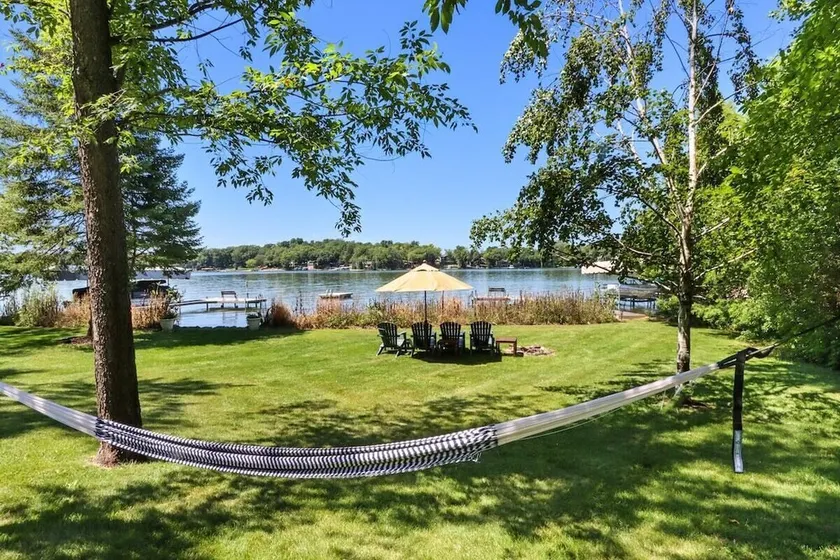 Whitewater Lakefront Lodge with 200 Feet Shoreline Docks Sunset Views - Image 1