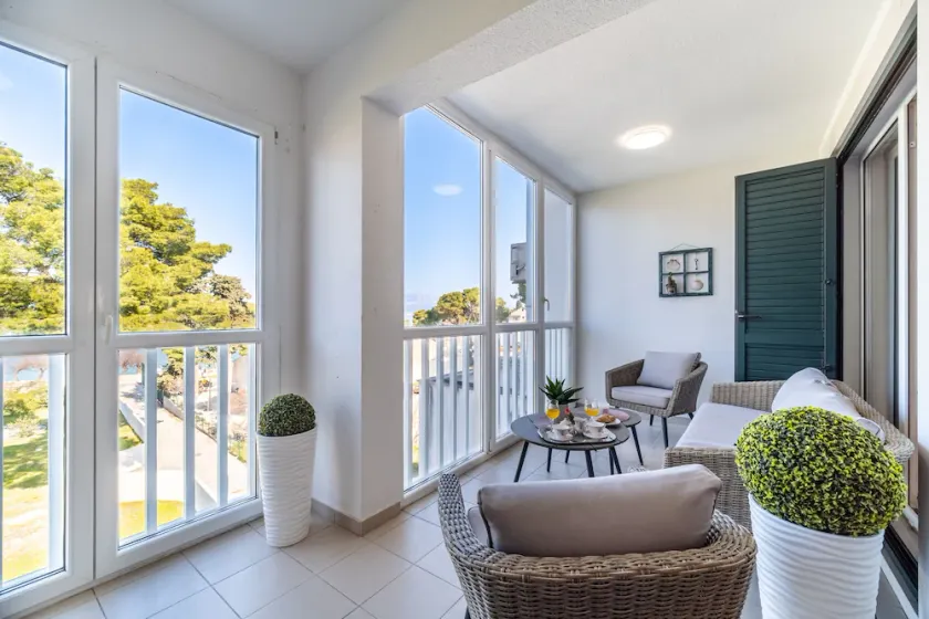 Seaside Retreat with Terrace- Fully Renewed Modern Apartment steps from the Sea! - Image 1