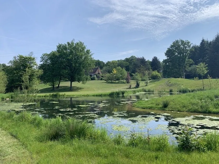 House in the middle of a landscape (tennis pool) - Image 1