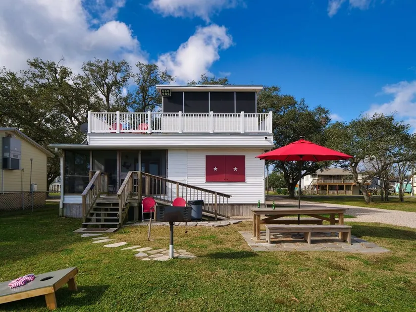 Waterfront Cabin On Bastrop Bayou With A Lighted Fishing Pier - Image 1