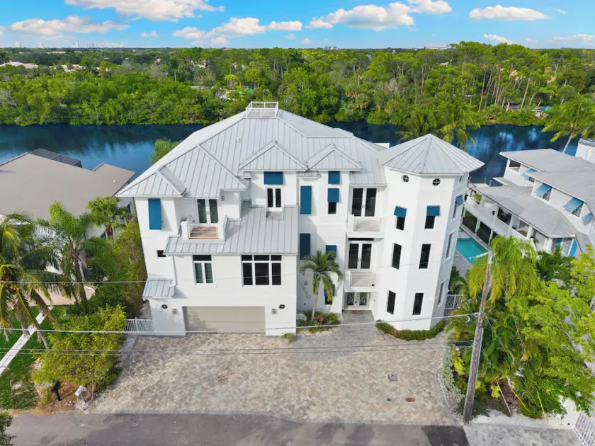 Waterfront Luxury Estate - 5BR/6.5BA, Heated Pool, Spa, Tiki Hut & Gulf Access - Image 1