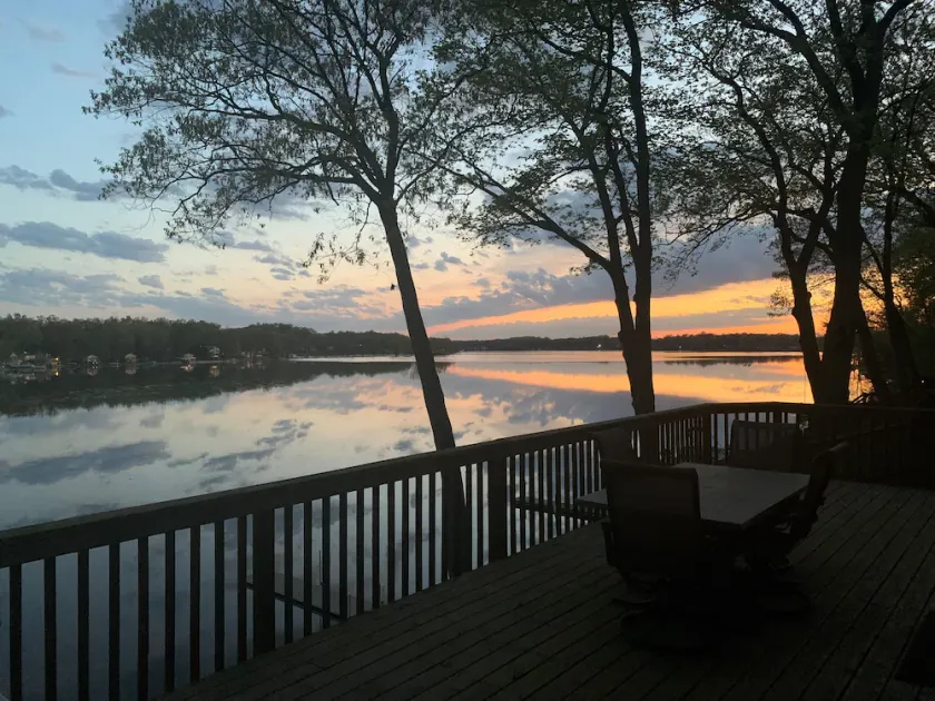 Lakefront Family Cottage • Sandy Beach • Panoramic Michigan Sunsets - Image 1