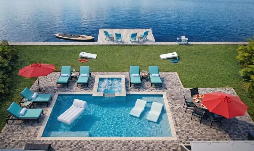 NEW Stunning Delray Waterfront Oasis - Heated Pool, Spa, Canal, Dock, Huge Patio, Pool Table! - Image 1