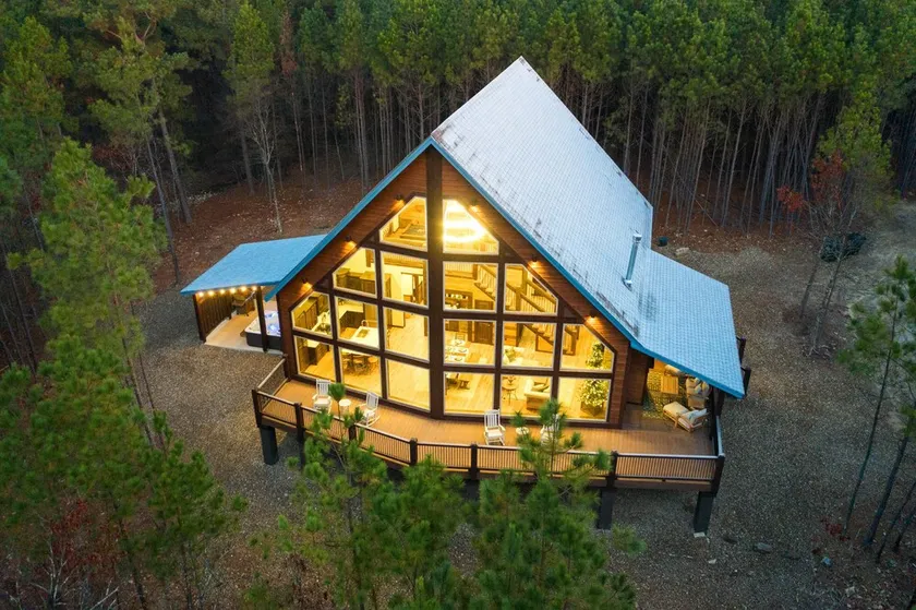 A one-of-a-kind architectural masterpiece with massive window wall with view! - Image 1