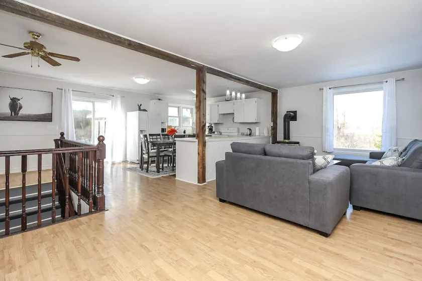 A cozy family retreat surrounded by trees, Nature, comfort and family memories. - Image 1