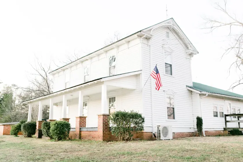 Historic 1880 Farmhouse with Modern Southern Charm - Image 1