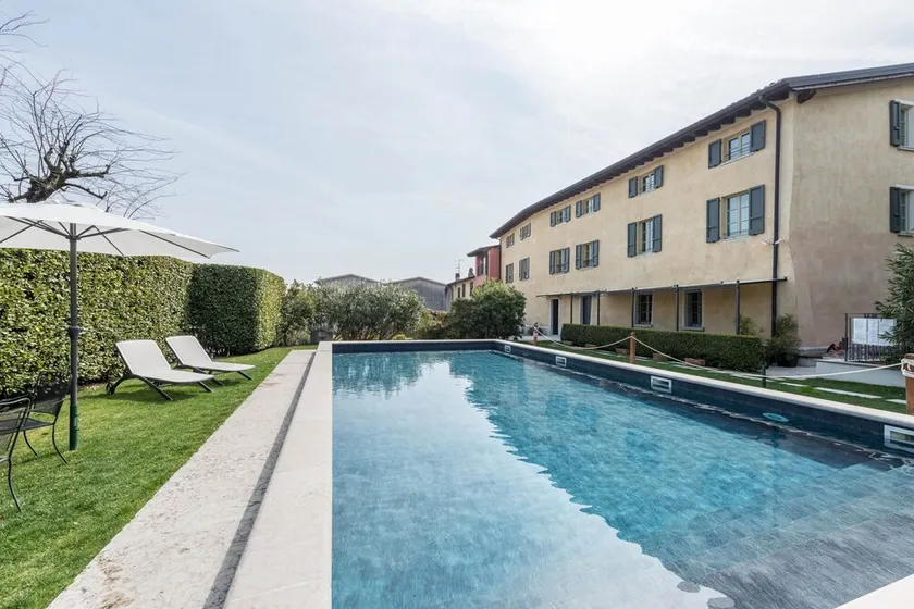 Apartamento 'Villa Antica Torre Ariosto' con piscina compartida, Wi-Fi y aire acondicionado - Image 1