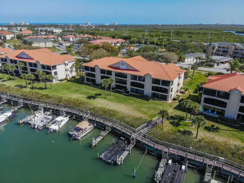 Riverfront views Watch the dolphin play in this Riverfront Bouchelle Condo ~ 462 Bouchelle 202 - Image 1