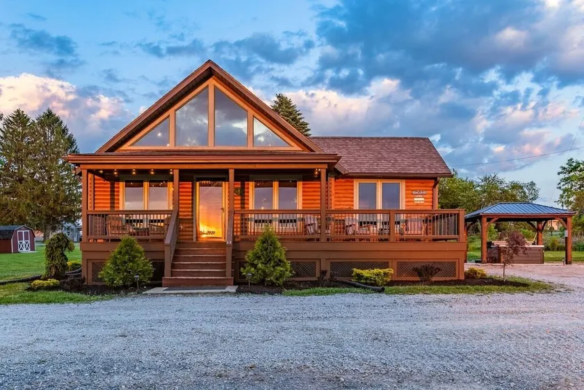 Cozy Log Cabin w/ HOT TUB under gazebo, fire pit, game room, and mountain views! - Image 1