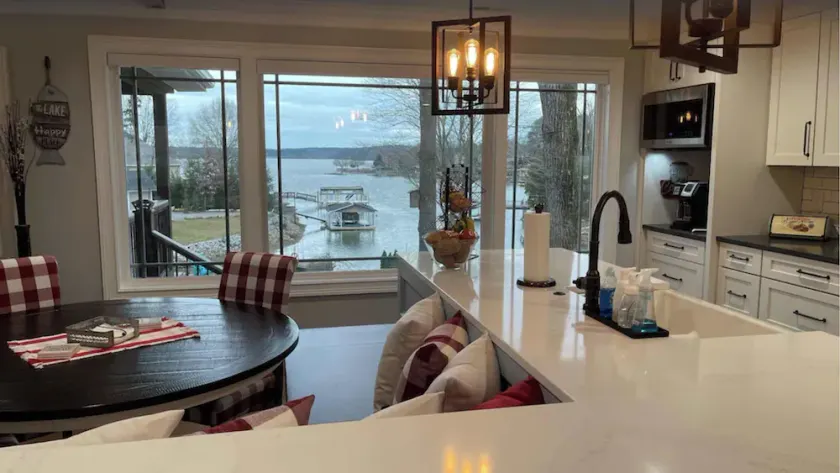 Lakefront home with private beach & gourmet kitchen - Image 1