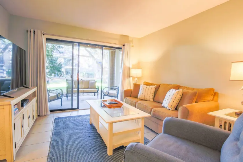 Dog Friendly Covered Patio with Garden Views; Option to Buy Seabrook Beach Club Amenity Cards - Image 1