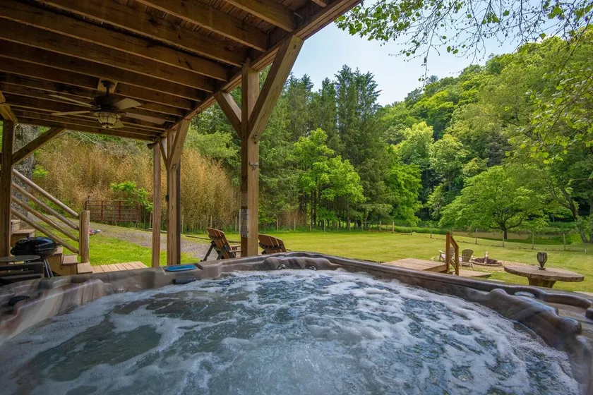 Woodsy Retreat with Hot Tub | Dogs Welcome | On River Time - Image 1