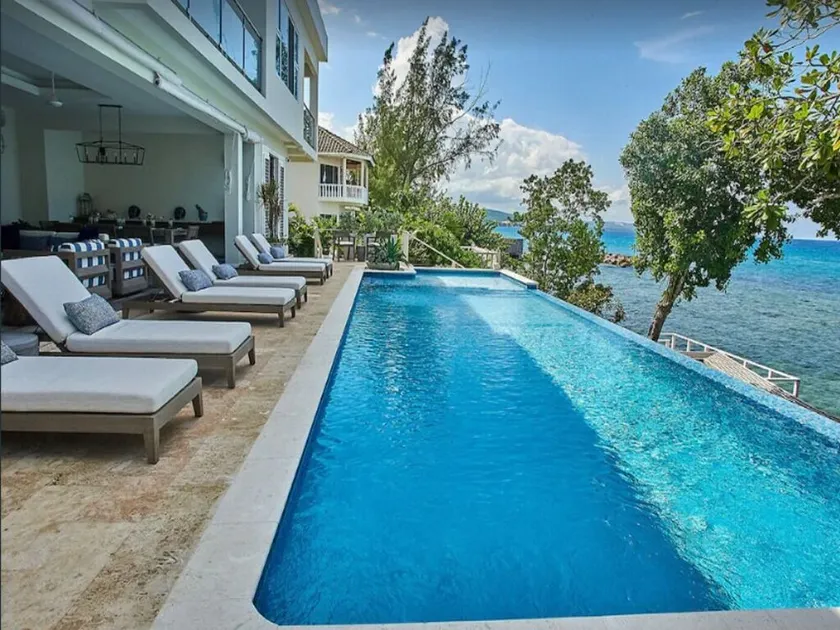 Petite Paradise - 4 Bedroom Beachfront Oasis - Image 1