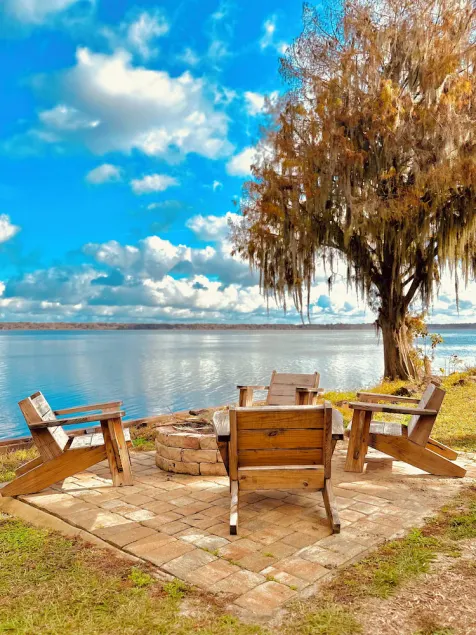 Waterfront Oasis, private dock, cozy fire pit, jacuzzi, stunning views & more - Image 1