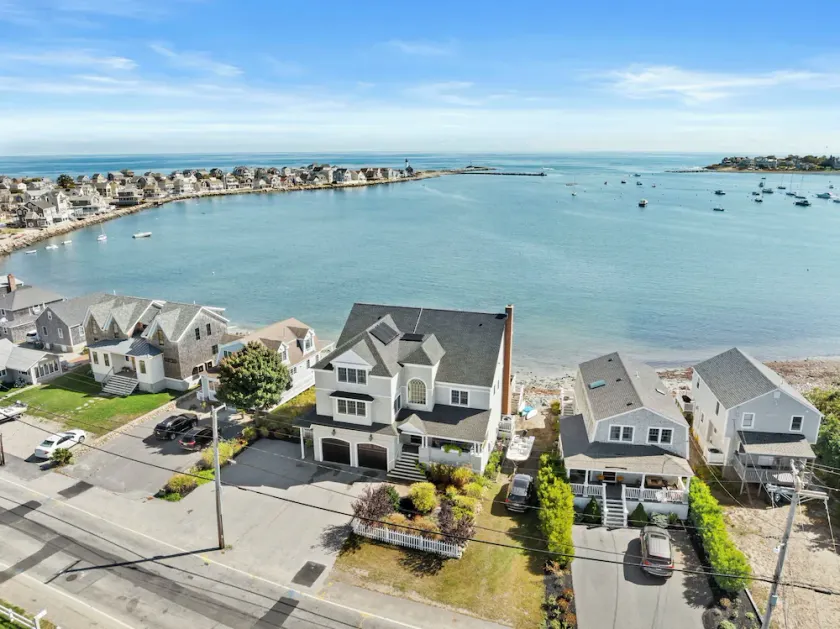 Breathtaking harbor views from spacious beachfront home. - Image 1