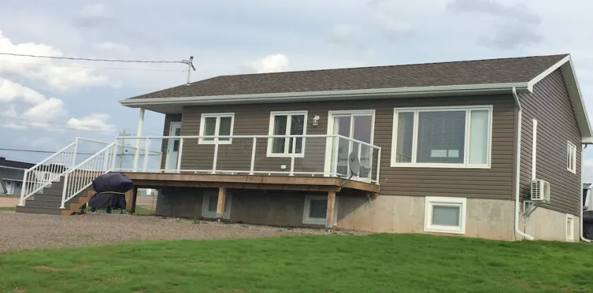 Main Floor (Unit 1) in House, Deck, Sunset, Water View (Cheticamp Harbour) - Image 1