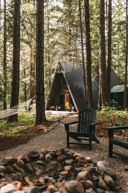 Moonshine Digs is the retro A-Frame of your dreams! Hot tub, record player, games, TVs and peace and quiet all nestled in the heart of the Cascade Mountains with Lake Cle Elum access. - Image 1