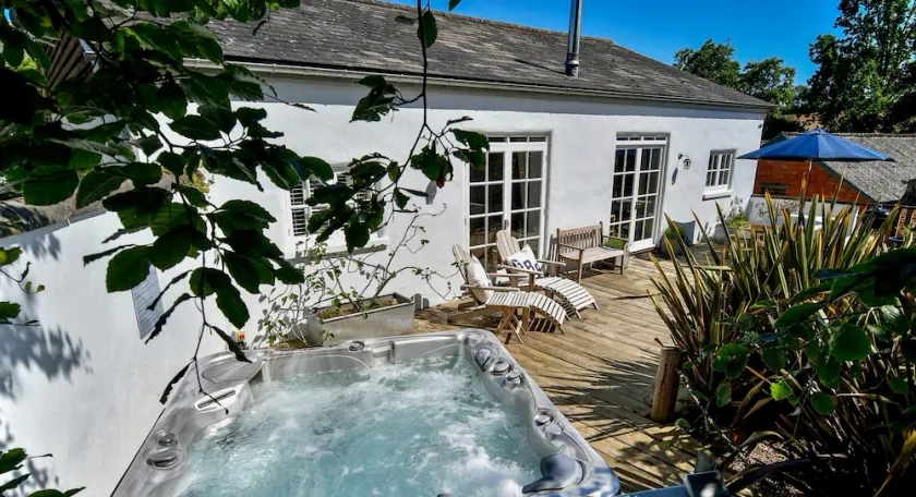 Superb detached Grade II listed barn conversion with private hot tub, close to coast - Image 1